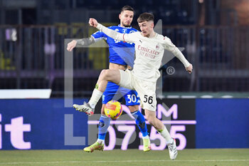 2021-12-22 - Alexis Saelemaekers (Milan) and Petar Stojanovic (Empoli) - EMPOLI FC VS AC MILAN - ITALIAN SERIE A - SOCCER