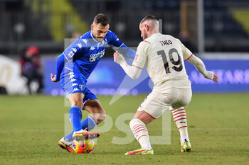 2021-12-22 - Nedim Bajrami (Empoli) and Theo Hernandez (Milan) - EMPOLI FC VS AC MILAN - ITALIAN SERIE A - SOCCER