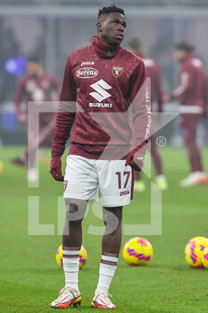 2021-12-22 - Wilfried Stephane Singo of Torino FC warms up during the Serie A 2021/22 football match between FC Internazionale and Torino FC at Giuseppe Meazza Stadium, Milan, Italy on December 22, 2021 - INTER - FC INTERNAZIONALE VS TORINO FC - ITALIAN SERIE A - SOCCER