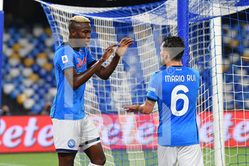 2021-09-26 - Napoli's forward Victor Osimhen celebrates with Napoli's defender Mario Rui after scoring the 1-0 goal  - SSC NAPOLI VS CAGLIARI CALCIO - ITALIAN SERIE A - SOCCER