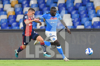 2021-09-26 - Napoli's defender Kalidou Koulibaly in action against Cagliari's midfielder Razvan Marin  - SSC NAPOLI VS CAGLIARI CALCIO - ITALIAN SERIE A - SOCCER