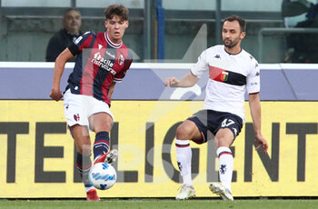2021-09-21 - Aaron Hickey (Bologna F.C.) (left) and Milan Badelj (Genoa CFC)  during the Italian Serie A soccer match Bologna F.C. vs Genoa C.F.C. at the Renato Dall'Ara stadium in Bologna, Italy, September 21,  2021. Photo: Michele Nucci - BOLOGNA FC VS GENOA CFC - ITALIAN SERIE A - SOCCER