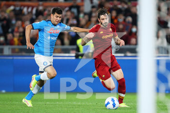 2021-10-24 - Hirving Lozano of Napoli (L) vies for the ball with Matias Vina of Roma (R) during the Italian championship Serie A football match between AS Roma and SSC Napoli on October 24, 2021 at Stadio Olimpico in Rome, Italy - AS ROMA VS SSC NAPOLI - ITALIAN SERIE A - SOCCER