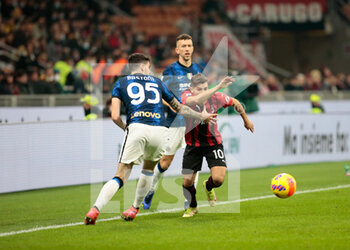 2021-11-07 - Brahim Diaz (Ac Milan) and Alessandro Bastoni (Fc Internazionale) during the Italian championship Serie A football match between AC Milan and FC Internazionale on November 7, 2021 at San Siro stadium in Milan, Italy - AC MILAN VS INTER - FC INTERNAZIONALE - ITALIAN SERIE A - SOCCER