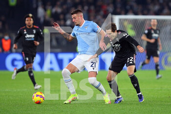 2021-11-20 - Sergej Milinkovic Savic of Lazio (L) vies fir the ball with Federico Chiesa of Juventus (R) during the Italian championship Serie A football match between SS Lazio and Juventus FC on November 20, 2021 at Stadio Olimpico in Rome, Italy - SS LAZIO VS JUVENTUS FC - ITALIAN SERIE A - SOCCER