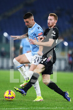 2021-11-20 - Sergej Milinkovic Savic of Lazio (L) vies for the ball with Dejan Kulusevski of Juventus (R) during the Italian championship Serie A football match between SS Lazio and Juventus FC on November 20, 2021 at Stadio Olimpico in Rome, Italy - SS LAZIO VS JUVENTUS FC - ITALIAN SERIE A - SOCCER