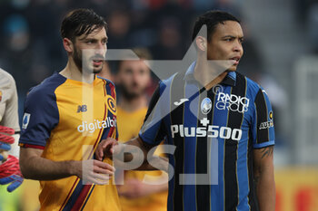 2021-12-18 - Luis Muriel (Atalanta Bergamasca Calcio) and Matias Vina (AS Roma) - ATALANTA BC VS AS ROMA - ITALIAN SERIE A - SOCCER