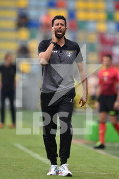 2021-10-02 - FROSINONE, ITALY - October 2 :  Head Coach Fabio Grosso of Frosinone gives tactics to is players  during  Italian  Serie A soccer match between  Frosinone and Cittadella  at Stadio Benito Stirpe on October 2,2021 in Frosinone Italy - FROSINONE CALCIO VS AS CITTADELLA - ITALIAN SERIE B - SOCCER