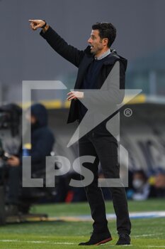 2021-12-18 - FROSINONE, ITALY - December 18 : Head Coach Fabio Grosso of Frosinone gestures during  Italian  Serie B soccer match between  Frosinone and Spal at Stadio Benito Stirpe 
on December 18,2021  in Frosinone Italy - FROSINONE CALCIO VS SPAL - ITALIAN SERIE B - SOCCER