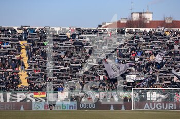 2021-12-18 - US Alessandria Calcio 1912 fans show support for their team by holding up scarfs - US ALESSANDRIA VS PARMA CALCIO - ITALIAN SERIE B - SOCCER