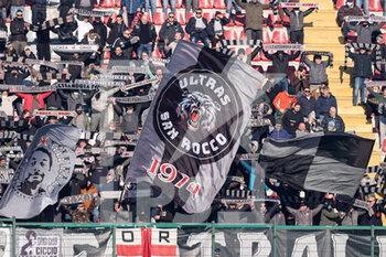 2021-12-18 - US Alessandria Calcio 1912 fans show support for their team by holding up scarfs and waving flags - US ALESSANDRIA VS PARMA CALCIO - ITALIAN SERIE B - SOCCER