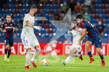 2021-08-22 - Gonzalo Melero of Levante UD and Isco Alarcon of Real Madrid during the Spanish championship La Liga football match between Levante UD and Real Madrid on August 22, 2021 at Ciutat de Valencia stadium in Valencia, Spain - Photo Ivan Terron / Spain DPPI / DPPI - LEVANTE UD VS REAL MADRID - SPANISH LA LIGA - SOCCER
