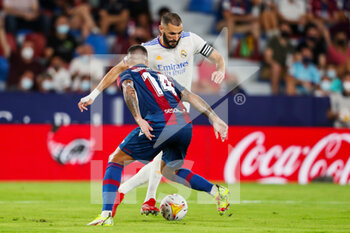 2021-08-22 - Karim Benzema of Real Madrid CF and Ruben Vezo of Levante UD during the Spanish championship La Liga football match between Levante UD and Real Madrid on August 22, 2021 at Ciutat de Valencia stadium in Valencia, Spain - Photo Ivan Terron / Spain DPPI / DPPI - LEVANTE UD VS REAL MADRID - SPANISH LA LIGA - SOCCER