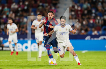 2021-08-22 - Isco Alarcon of Real Madrid CF and Jose Campana of Levante UD during the Spanish championship La Liga football match between Levante UD and Real Madrid on August 22, 2021 at Ciutat de Valencia stadium in Valencia, Spain - Photo Ivan Terron / Spain DPPI / DPPI - LEVANTE UD VS REAL MADRID - SPANISH LA LIGA - SOCCER