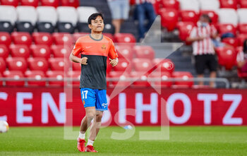 2021-09-11 - Takefusa Kubo of RCD Mallorca warms up during the Spanish league, La Liga Santander, football match played between Athletic Club and RCD Mallorca at San Mames stadium on September 11, 2021 in Bilbao, Spain - ATHLETIC CLUB VS RCD MALLORCA - SPANISH LA LIGA - SOCCER