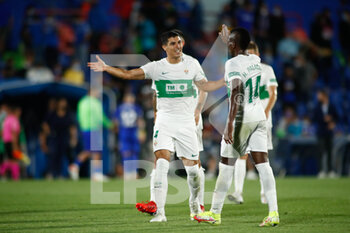 2021-09-13 - Diego Gonzalez of Elche celebrates the victory with Helibelton Palacios during the spanish league, La Liga Santander, football match played between Getafe CF and Elche CF at Coliseo Alfonso Perez stadium on September 13, 2021, in Getafe, Madrid, Spain - GETAFE CF VA ELCHE CF - SPANISH LA LIGA - SOCCER