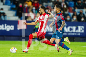 2021-10-28 - Matheus Cunha of Atletico de Madrid and Ruben Vezo of Levante UD during the Spanish championship Liga football match between Levante UD and Atletico de Madrid on October 28, 2021 at the Ciutat de Valencia Stadium in Valencia, Spain - LEVANTE UD VS ATLETICO DE MADRID - SPANISH LA LIGA - SOCCER