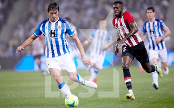 2021-10-31 - Robin Le Normand of Real Sociedad and Inaki Williams of Athletic Club in action during the Spanish championship La Liga football match between Real Sociedad and Athletic Club on October 31, 2021 at Reale Arena in San Sebastian, Spain - REAL SOCIEDAD VS ATHLETIC CLUB - SPANISH LA LIGA - SOCCER