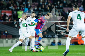 2021-12-18 - Frenkie de Jong of FC Barcelona and Omar Mascarell of Elche during the Spanish championship La Liga football match between FC Barcelona and Elche CF on December 18, 2021 at Camp Nou stadium in Barcelona, Spain - FC BARCELONA VS ELCHE CF - SPANISH LA LIGA - SOCCER