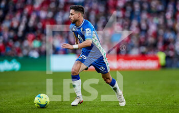 2021-12-19 - Alex Moreno of Real Betis Balompie during the Spanish championship La Liga football match between Athletic Club and Real Betis Balompie on December 19, 2021 at San Mames stadium in Bilbao, Spain - ATHLETIC CLUB VS REAL BETIS BALOMPIE - SPANISH LA LIGA - SOCCER