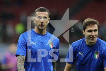2021-10-06 - Federico Bernardeschi of Italy warms up during the UEFA Nations League Finals 2021 semi-final football match between Italy and Spain at Giuseppe Meazza Stadium, Milan, Italy on October 06, 2021 - SEMIFINALE 2021 - ITALIA VS SPAGNA - UEFA NATIONS LEAGUE - SOCCER