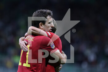 2021-10-06 - Mikel Oyarzabal of Spain and Bryan Gil of Spain celebrate the victory at the end of the match during the UEFA Nations League Finals 2021 semi-final football match between Italy and Spain at Giuseppe Meazza Stadium, Milan, Italy on October 06, 2021 - SEMIFINALE 2021 - ITALIA VS SPAGNA - UEFA NATIONS LEAGUE - SOCCER