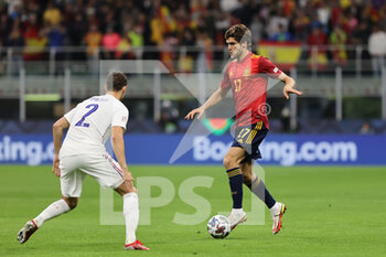 10/10/2021 - Marcos Alonso of Spain fights for the ball against Benjamin Pavard of France during the UEFA Nations League Finals 2021 final football match between Spain and France at Giuseppe Meazza Stadium, Milan, Italy on October 10, 2021 - FINALE - SPAGNA VS FRANCIA - UEFA NATIONS LEAGUE - CALCIO