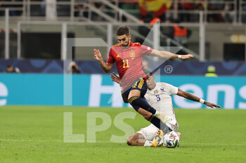 10/10/2021 - Ferran Torres of Spain fights for the ball against Presnel Kimpembe of France during the UEFA Nations League Finals 2021 final football match between Spain and France at Giuseppe Meazza Stadium, Milan, Italy on October 10, 2021 - FINALE - SPAGNA VS FRANCIA - UEFA NATIONS LEAGUE - CALCIO
