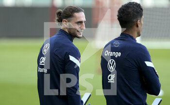 2021-10-08 - Adrien Rabiot, Raphael Varane of France during the French team training session in preparation for the UEFA Nations League final on October 8, 2021 at Stadio Olimpico Grande Torino in Turin, Italy - FRENCH TEAM TRAINING IN PREPARATION FOR THE UEFA NATIONS LEAGUE FINAL - UEFA NATIONS LEAGUE - SOCCER