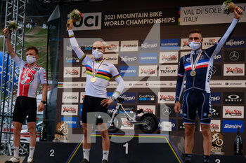 2021-08-28 - Podium of UCI MTB Elite man World Championships in Val di Sole (Italy): gold metal for (2) - Nino Schurter (Switzerland), silver metal (3) - Mathias Flueckiger (Switzerland), bronze medal (7) - Victor Koretzky (France) - UCI MTB WORLD CHAMPIONSHIP - CROSS COUNTRY - ELITE MEN RACE - MTB - MOUNTAIN BIKE - CYCLING