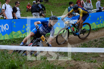 2021-08-28 - (18) - Gil-li Gonen (Israel) followed by (79) - Oscar Lind (Sweden) - UCI MTB WORLD CHAMPIONSHIP - CROSS COUNTRY - MEN U23 RACE - MTB - MOUNTAIN BIKE - CYCLING