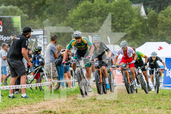 2021-08-26 - Riders during the Cross Country Short Track XCC at the 2021 MTB World Championships, Mountain Bike cycling event on August 26, 2021 in Val Di Sole, Italy - Photo Olly Bowman / DPPI - 2021 MTB WORLD CHAMPIONSHIPS - MTB - MOUNTAIN BIKE - CYCLING