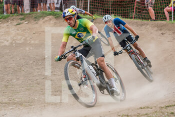 2021-08-26 - Henrique AVANCINI of Brazil, 2nd place elite men, and Christopher BLEVINS of the USA, 1st place elite men, during the Cross Country Short Track XCC at the 2021 MTB World Championships, Mountain Bike cycling event on August 26, 2021 in Val Di Sole, Italy - Photo Olly Bowman / DPPI - 2021 MTB WORLD CHAMPIONSHIPS - MTB - MOUNTAIN BIKE - CYCLING