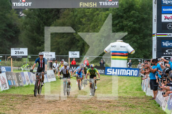 2021-08-26 - Mens elite finish line, 1st place Christopher BLEVINS of the USA, 2nd place Henrique AVANCINI of Brazil, 3rd place Maximilian BRANDL of Germany, during the Cross Country Short Track XCC at the 2021 MTB World Championships, Mountain Bike cycling event on August 26, 2021 in Val Di Sole, Italy - Photo Olly Bowman / DPPI - 2021 MTB WORLD CHAMPIONSHIPS - MTB - MOUNTAIN BIKE - CYCLING