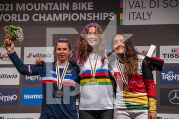 2021-08-27 - Womens podium during the Four Cross (4X), 2021 MTB World Championships, 1st place Michaela HAJKOVA of the Czech Cepublic, 2nd place Mathilde BERNARD of France, 3rd place Anna Sara ROJAS of Bolivia, Mountain Bike cycling event on August 27, 2021 in Val Di Sole, Italy - Photo Olly Bowman / DPPI - 2021 MTB WORLD CHAMPIONSHIPS - MTB - MOUNTAIN BIKE - CYCLING
