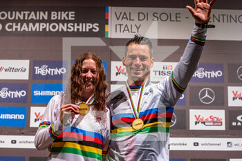 2021-08-27 - Tomas SLAVIK and Michaela HAJKOVA, both of the Czech Republic, 1st place man and woman during the 2021 MTB World Championships, Four Cross (4X), Mountain Bike cycling event on August 27, 2021 in Val Di Sole, Italy - Photo Olly Bowman / DPPI - 2021 MTB WORLD CHAMPIONSHIPS - MTB - MOUNTAIN BIKE - CYCLING