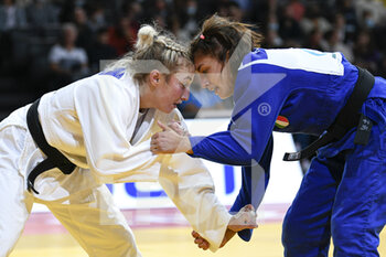 2021-10-16 - Women -48 kg, Irina DOLGOVA of Russia (white) and Assunta SCUTTO (blue) of Italy compete during the Paris Grand Slam 2021, Judo event on October 16, 2021 at AccorHotels Arena in Paris, France - PARIS GRAND SLAM 2021, JUDO EVENT - JUDO - CONTACT