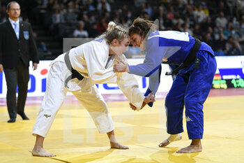 2021-10-16 - Women -48 kg, Irina DOLGOVA of Russia (white) and Assunta SCUTTO (blue) of Italy compete during the Paris Grand Slam 2021, Judo event on October 16, 2021 at AccorHotels Arena in Paris, France - PARIS GRAND SLAM 2021, JUDO EVENT - JUDO - CONTACT