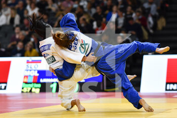 2021-10-16 - Women -57 kg, Caroline FRITZE of Germany Silver medal (blue) throws Jessica PEREIRA of Brazil during the Paris Grand Slam 2021, Judo event on October 16, 2021 at AccorHotels Arena in Paris, France - PARIS GRAND SLAM 2021, JUDO EVENT - JUDO - CONTACT