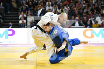 2021-10-16 - Men -73 kg, Denis IARTCEV (white) of Russia and Theo RIQUIN (blue) of France Silver medal compete during the Paris Grand Slam 2021, Judo event on October 16, 2021 at AccorHotels Arena in Paris, France - PARIS GRAND SLAM 2021, JUDO EVENT - JUDO - CONTACT