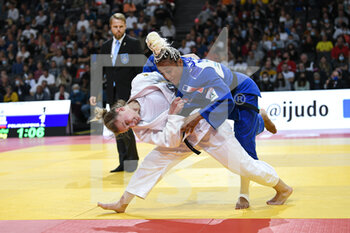 2021-10-16 - Women -57 kg, Caroline FRITZE (white) of Germany Silver medal and Martha FAWAZ (blue) of France compete during the Paris Grand Slam 2021, Judo event on October 16, 2021 at AccorHotels Arena in Paris, France - PARIS GRAND SLAM 2021, JUDO EVENT - JUDO - CONTACT