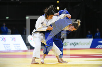 2021-10-16 - Women -52 kg, Mascha BALLHAUS (blue) of Germany and Gefen PRIMO (white) of Israel compete during the Paris Grand Slam 2021, Judo event on October 16, 2021 at AccorHotels Arena in Paris, France - PARIS GRAND SLAM 2021, JUDO EVENT - JUDO - CONTACT