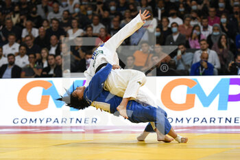 2021-10-16 - Women -52 kg, Khorloodoi BISHRELT of Mongolia bronze medal throws Chloe DEVICTOR of France and wins by ippon with Ura Nage during the Paris Grand Slam 2021, Judo event on October 16, 2021 at AccorHotels Arena in Paris, France - PARIS GRAND SLAM 2021, JUDO EVENT - JUDO - CONTACT