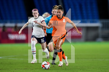 2021-07-30 - Rose Lavelle of the United States and Lieke Martens of the Netherlands during the Olympic Games Tokyo 2020, Football Women's Quarter Final match between Netherlands and United States on July 30, 2021 at International Stadium Yokohama in Yokohama, Japan - Photo Pablo Morano / Orange Pictures / DPPI - OLYMPIC GAMES TOKYO 2020, JULY 30, 2021 - OLYMPIC GAMES TOKYO 2020 - OLYMPIC GAMES