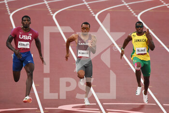 2021-08-01 - Fred Kerley (USA), Andre de Grasse (CAN), Yohan Blake (JAM) compete on men's 100m semi-final during the Olympic Games Tokyo 2020, Athletics, on August 1, 2021 at Tokyo Olympic Stadium in Tokyo, Japan - Photo Yoann Cambefort / Marti Media / DPPI - OLYMPIC GAMES TOKYO 2020, AUGUST 1, 2021 - OLYMPIC GAMES TOKYO 2020 - OLYMPIC GAMES