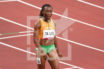 2021-08-03 - Marie-Josee Ta Lou (CIV) competes on women's 200m semi-final during the Olympic Games Tokyo 2020, Athletics, on August 2, 2021 at Tokyo Olympic Stadium in Tokyo, Japan - Photo Yoann Cambefort / Marti Media / DPPI - OLYMPIC GAMES TOKYO 2020, AUGUST 02, 2021 - OLYMPIC GAMES TOKYO 2020 - OLYMPIC GAMES