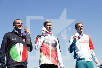 2021-08-05 - PALTRINIERI Gregorio (ITA) Bronze Medal, WELLBROCK Florian (GER) Gold Medal, RASOVSZKY Kristof (HUN) Silver Medal during the Olympic Games Tokyo 2020, Swimming Marathon Men's 10km Medal Ceremony on August 5, 2021 at Odaiba Marine Park in Tokyo, Japan - Photo Takamitsu Mifune / Photo Kishimoto / DPPI - OLYMPIC GAMES TOKYO 2020, AUGUST 05, 2021 - OLYMPIC GAMES TOKYO 2020 - OLYMPIC GAMES