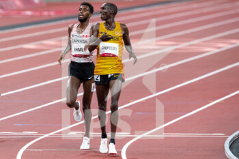 2021-08-06 - AHMED Mohammed (CAN) Silver Medal, CHEPTEGEI Joshua (UGA) Gold Medal during the Olympic Games Tokyo 2020, Athletics Men's 5000m Final on August 6, 2021 at Olympic Stadium in Tokyo, Japan - Photo Andy Astfalck / Orange Pictures / DPPI - OLYMPIC GAMES TOKYO 2020, AUGUST 06, 2021 - OLYMPIC GAMES TOKYO 2020 - OLYMPIC GAMES