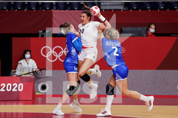 2021-08-08 - Polina Vedekhina of Russia, Laura Flippes of France and Polina Kuznetsova of Russia during the Olympic Games Tokyo 2020, Handball Women's Gold Medal Match between ROC and France on August 8, 2021 at Yoyogi National Stadium in Tokyo, Japan - Photo Pim Waslander / Orange Pictures / DPPI - OLYMPIC GAMES TOKYO 2020, AUGUST 08, 2021 - OLYMPIC GAMES TOKYO 2020 - OLYMPIC GAMES
