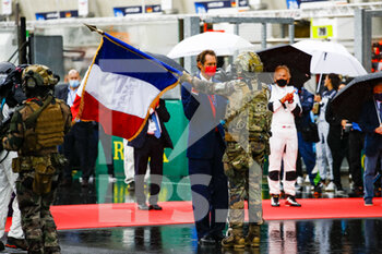 2021-08-21 - Army bringing the starting flag to John Elkann, Chairman and CEO of Ferrari, Exor, Stellantis during the 24 Hours of Le Mans 2021, 4th round of the 2021 FIA World Endurance Championship, FIA WEC, on the Circuit de la Sarthe, from August 21 to 22, 2021 in Le Mans, France - Photo Xavi Bonilla / DPPI - 24 HOURS OF LE MANS 2021, 4TH ROUND OF THE 2021 FIA WORLD ENDURANCE CHAMPIONSHIP, WEC - ENDURANCE - MOTORS
